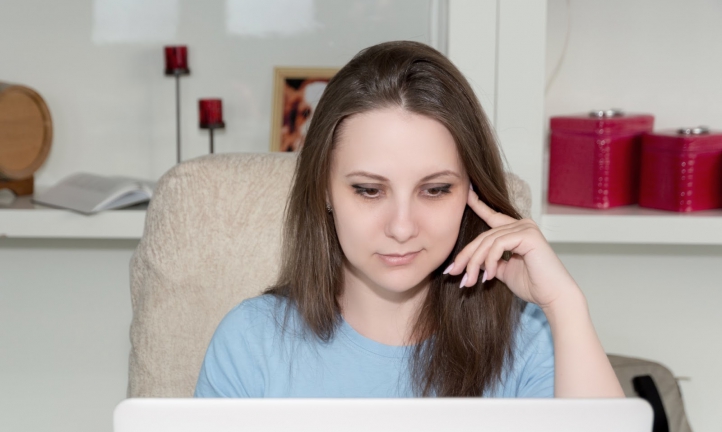 Woman reviewing digital waiver on her laptop