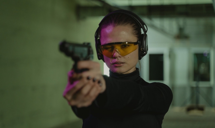 a woman at a shooting range