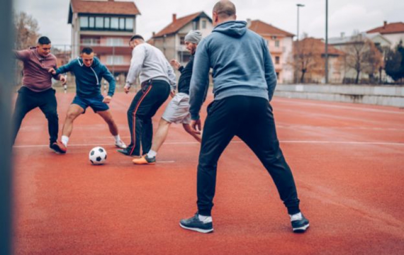 men playing football